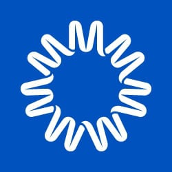 White stylized circular design resembling a sun or star on a solid blue background.
