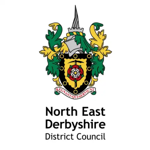 North East Derbyshire District Council crest featuring a shield, floral designs, and the motto "Regnant Qui Serviunt" below.