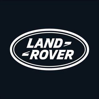 Land Rover logo featuring white text in all capital letters inside a white oval, set against a black background.